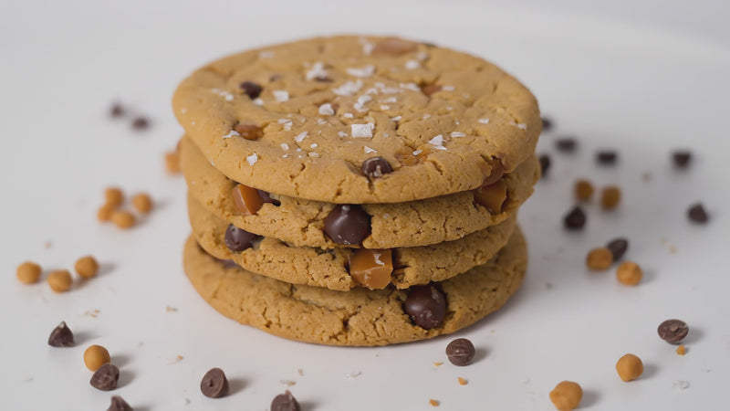 Close up shot of three sea salt chocolate chip cookies